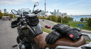 Durable black leather motorcycle gloves designed for the variable climate of Ontario, featuring reinforced palms and weather resistance.