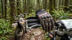 Reinforced knuckle protection on off-road motorcycle gloves for rugged Canadian trail riding.