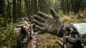 Close-up of silicone palm grips on off-road motorcycle gloves for precise clutch and brake control.