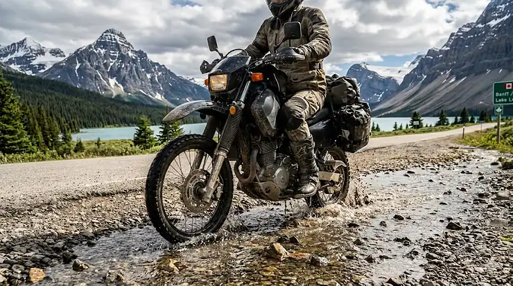 Adventure motorcycle rider touring the Icefields Parkway in Alberta wearing premium waterproof adventure boots during a transcontinental ride across Canada.