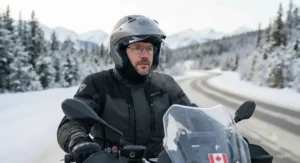 Motorcyclist wearing prescription glasses inside a full-face helmet without fogging during a winter ride in Canada.