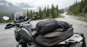 A compact and lightweight motorcycle rain suit packed inside its own storage pouch for long-distance touring.