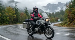 A woman wearing a properly fitted womens budget motorcycle rain suit during an autumn ride through British Columbia.