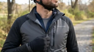 Comparing a heated vest vs heated jacket liner for motorcycle riding paired with a windproof outer shell.