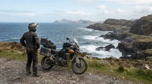 Testing wind protection in a textile vs leather motorcycle jacket for spring riding along a coastal route.
